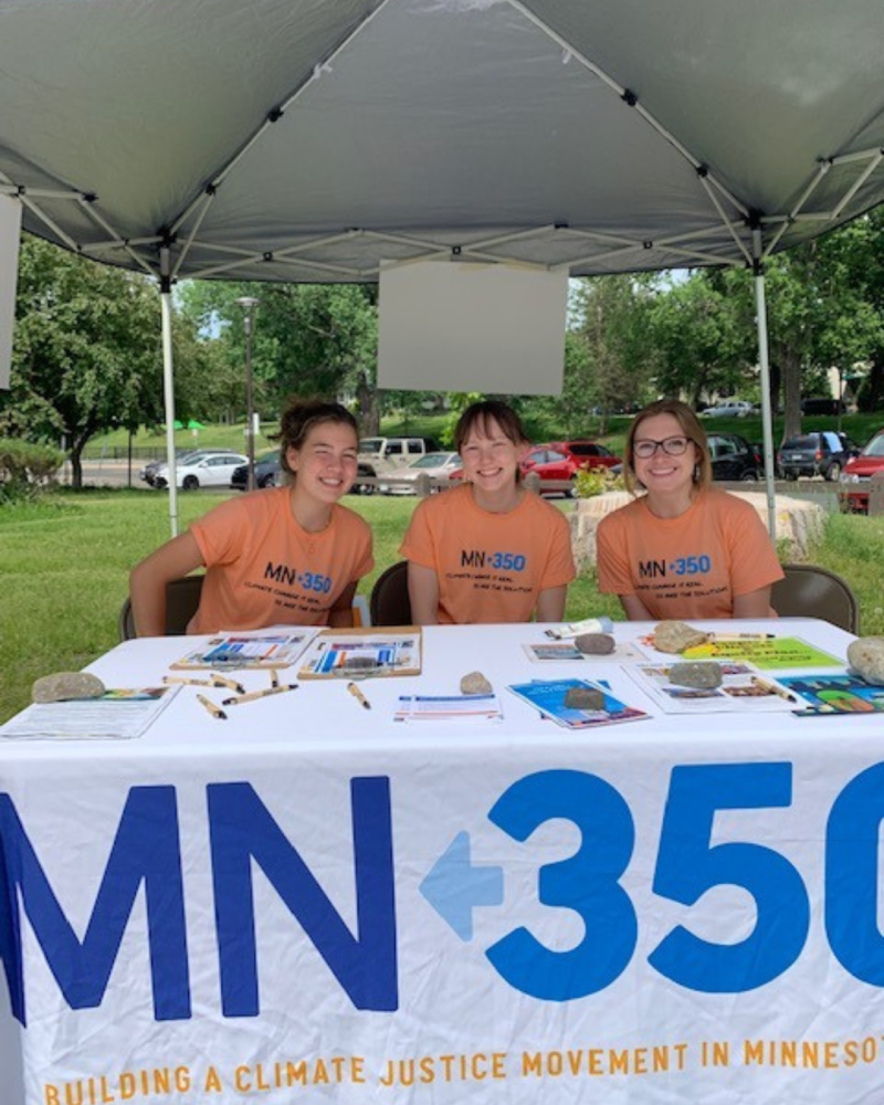 Sophie Greer with friends in campaign tent