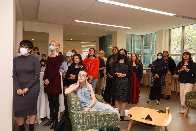 attendees of the STEMLA unveiling event seated and standing in the Park atrium 