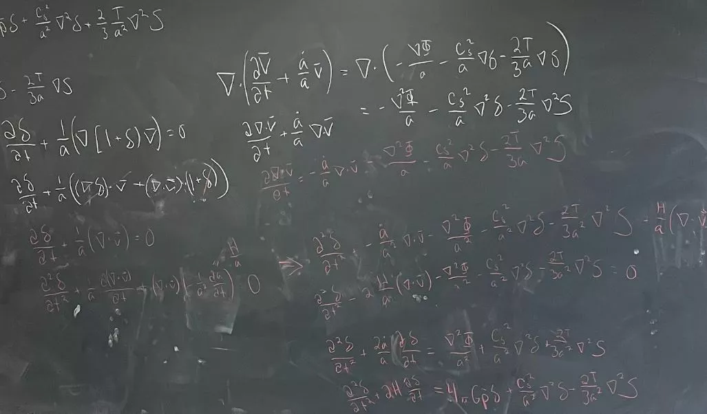 Blackboard with derivations written in chalk