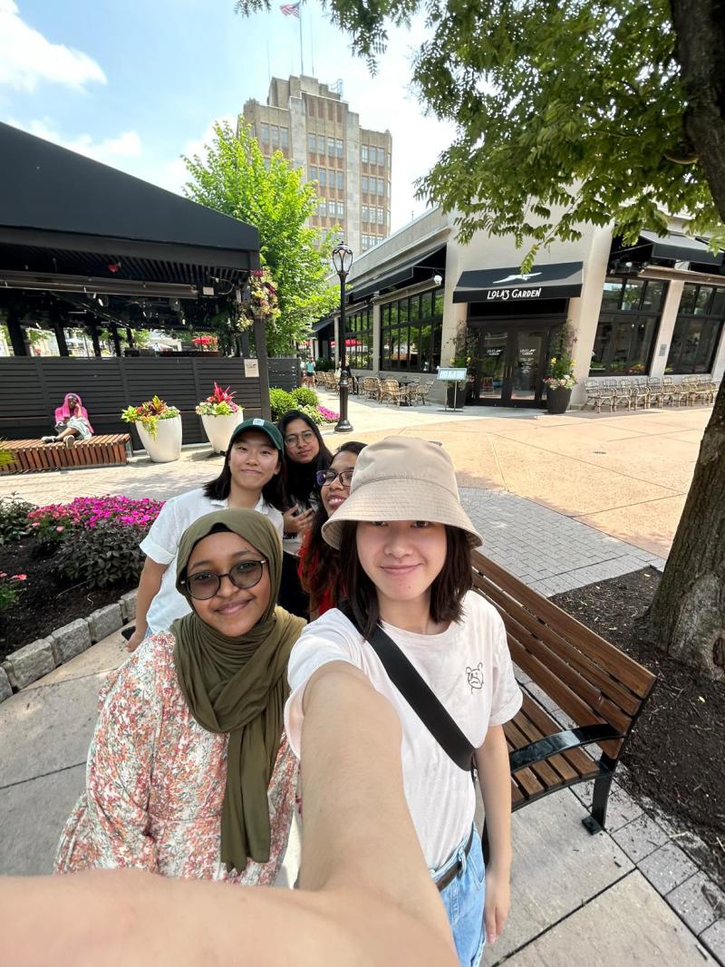 Group selfie in a shopping center. 