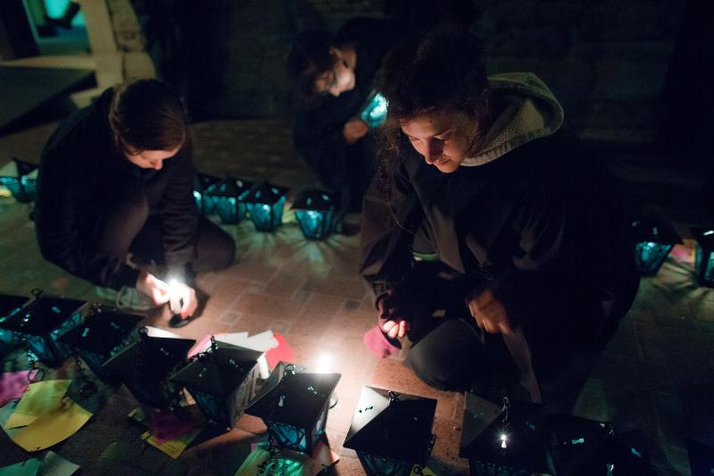 Upperclassmen preparing the lanterns to give to the first-years