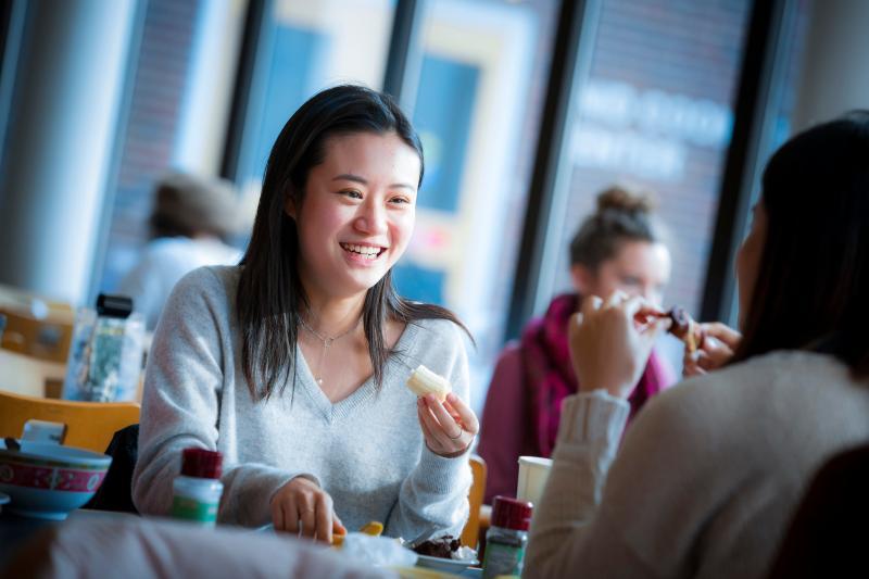 Student in New Dorm Dining Hall