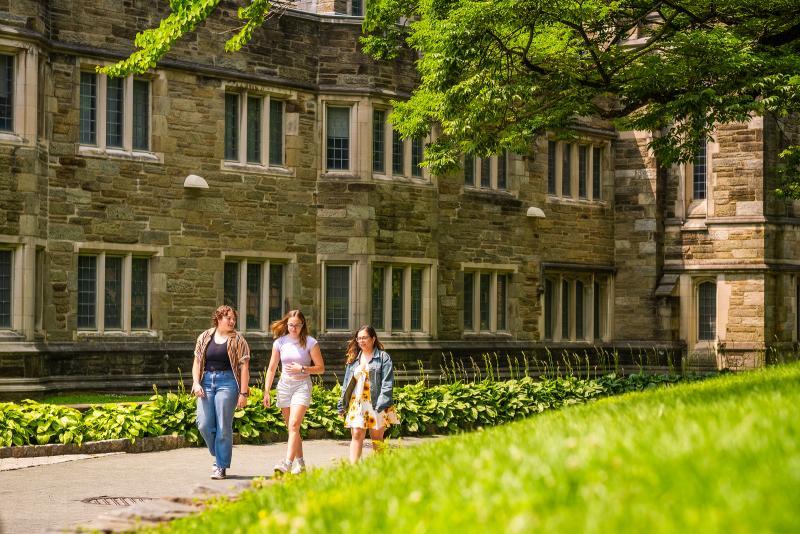 Students walking past Rhoads