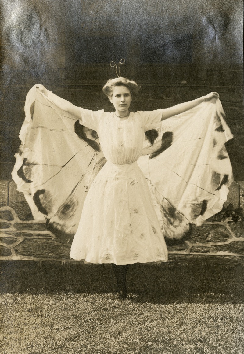 Class of 1912 student dressed as butterfly, their class animal, likely for the Freshman Show.