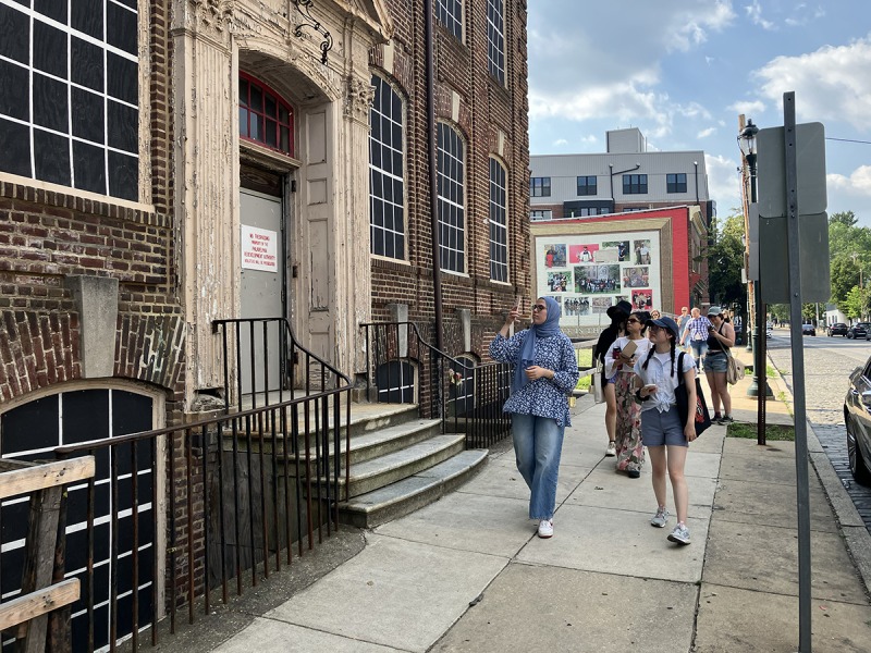 Students visit the Germantown YWCA as part of their summer digital scholarship.