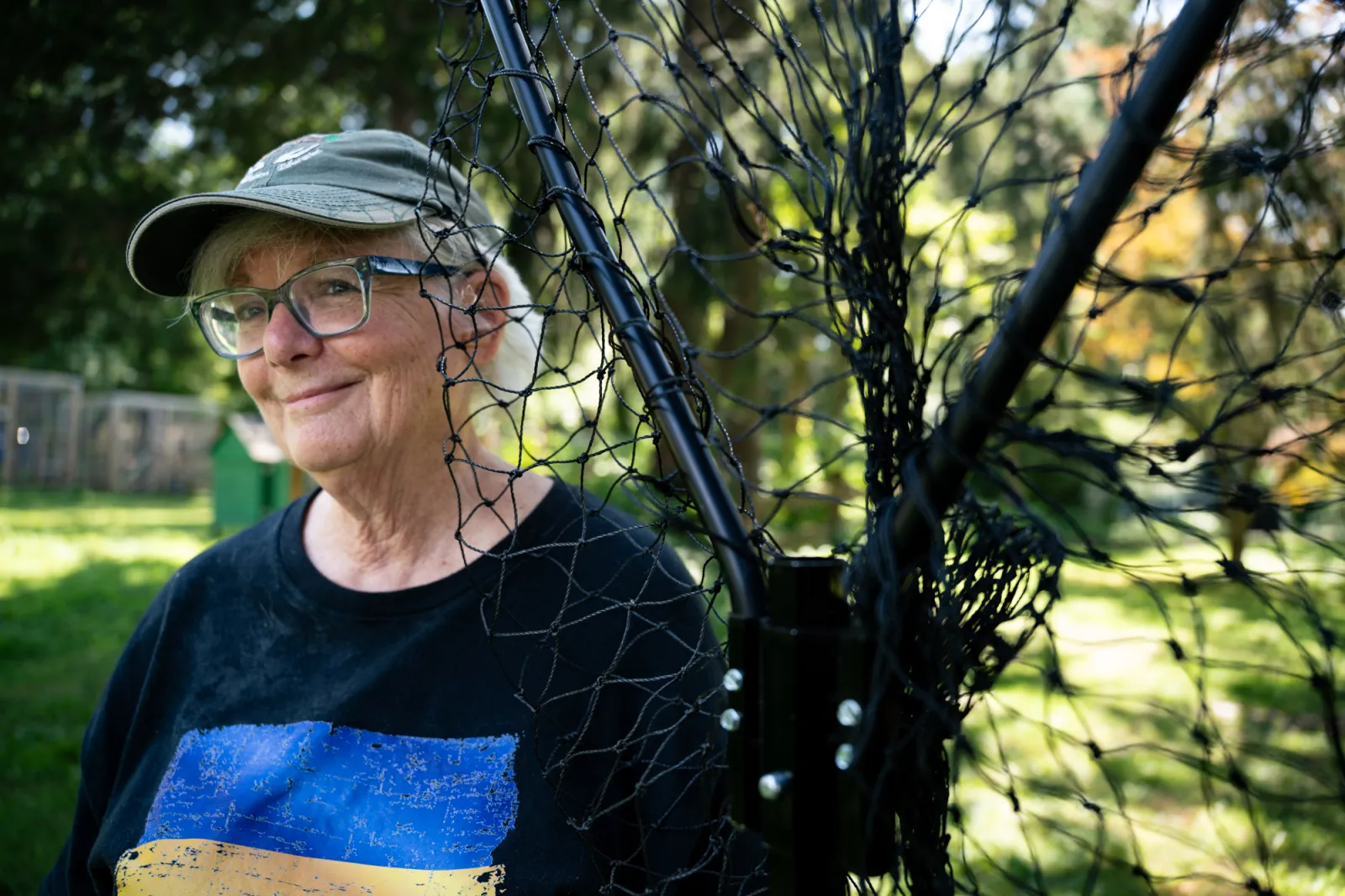 Barbara Miller ’75 poses with her favorite net