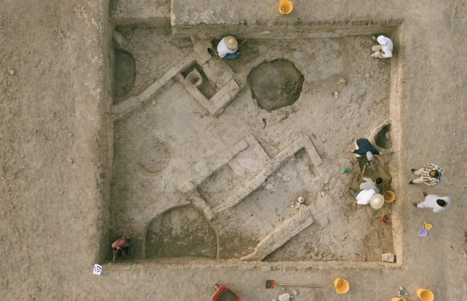 Two PhD in Archeology students posing on an excavation trip with one of the best archaeology schools in the world.