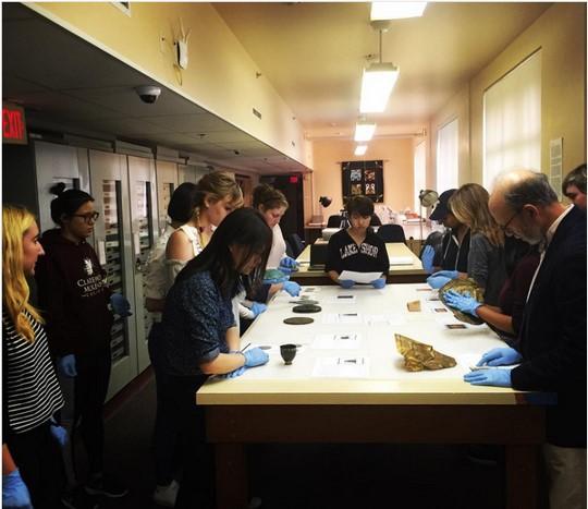 Students interacting with collections materials